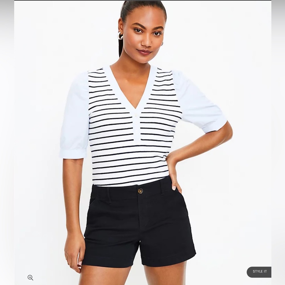 Front zip with button closure. Belt loops. Slash pockets. Back welt pockets.